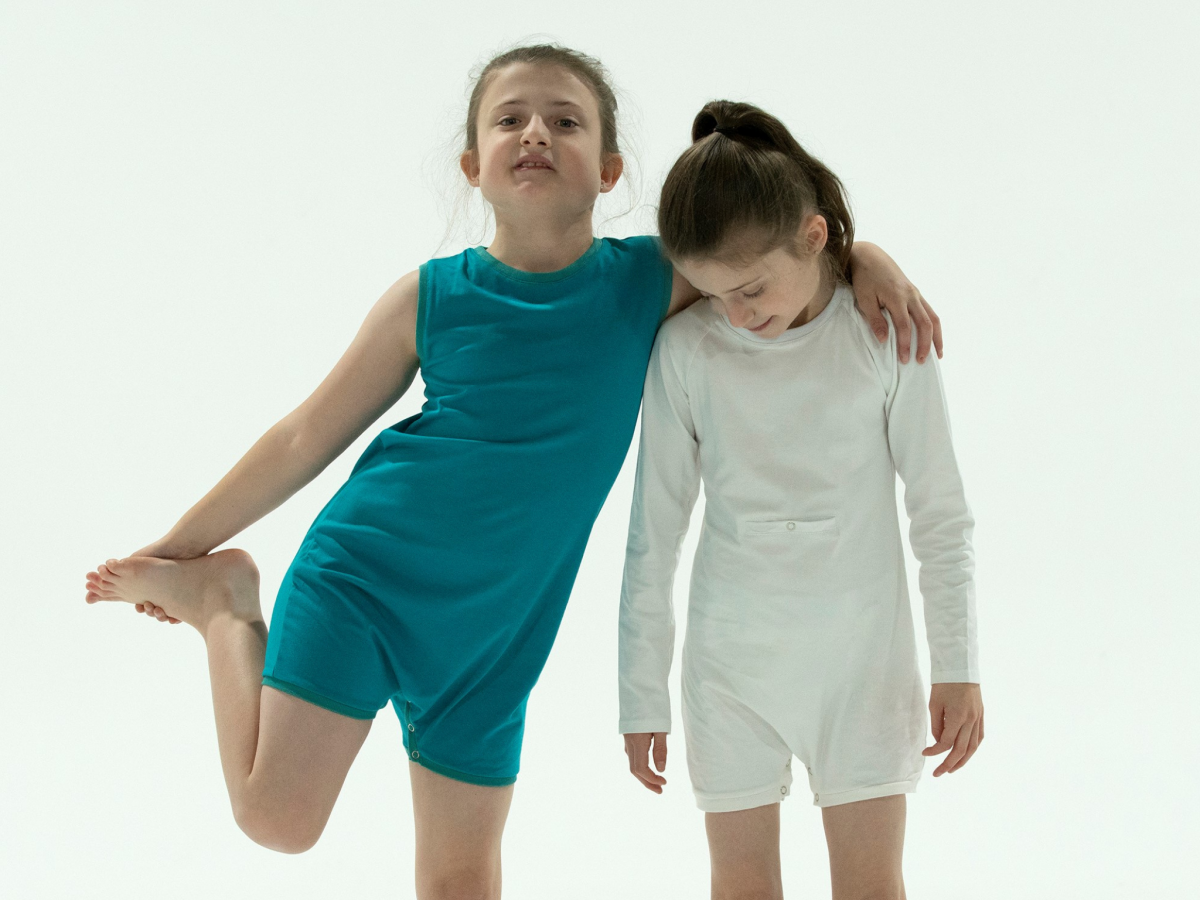 Wonsies bodysuit for kids and adults who have special needs