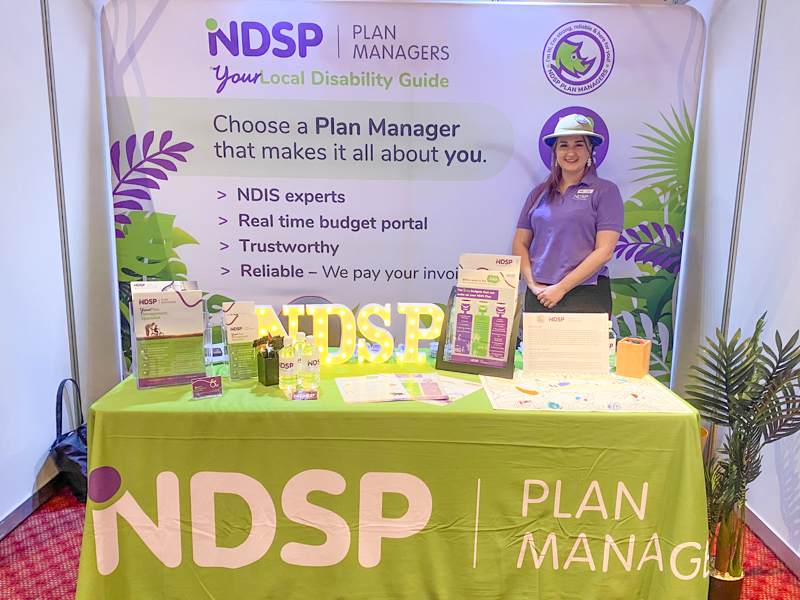 Zosie is manning the NDSP Plan Managers booth in an expo