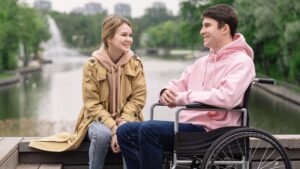disability support worker and a participant in a wheelchair